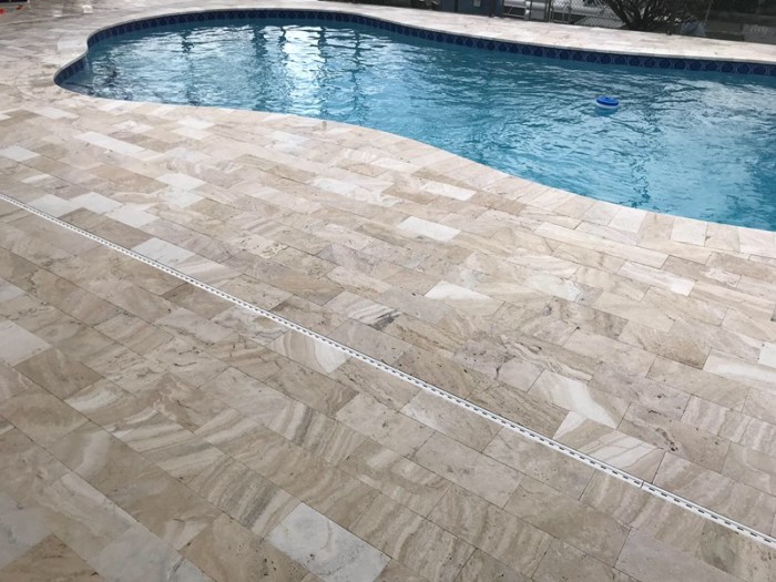 walnut travertine pavers pool deck with drain